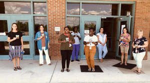 FES Staff Receives Harvey's Gift Cards